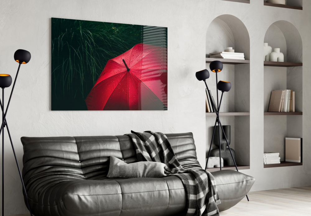 Red Umbrella glass wall art styled above a console in a foyer