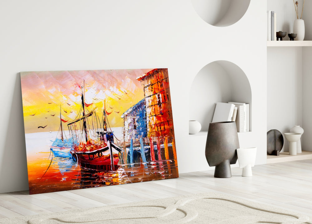 Close-up detail of scarlet and ochre buildings with moored fishing boats