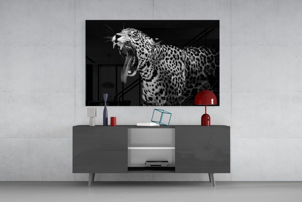 Leopard panel catching low light to reveal its chiaroscuro intensity