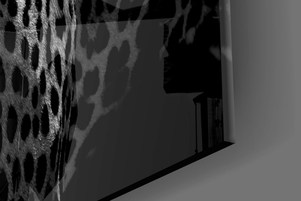 Leopard artwork anchoring a library with moody palette