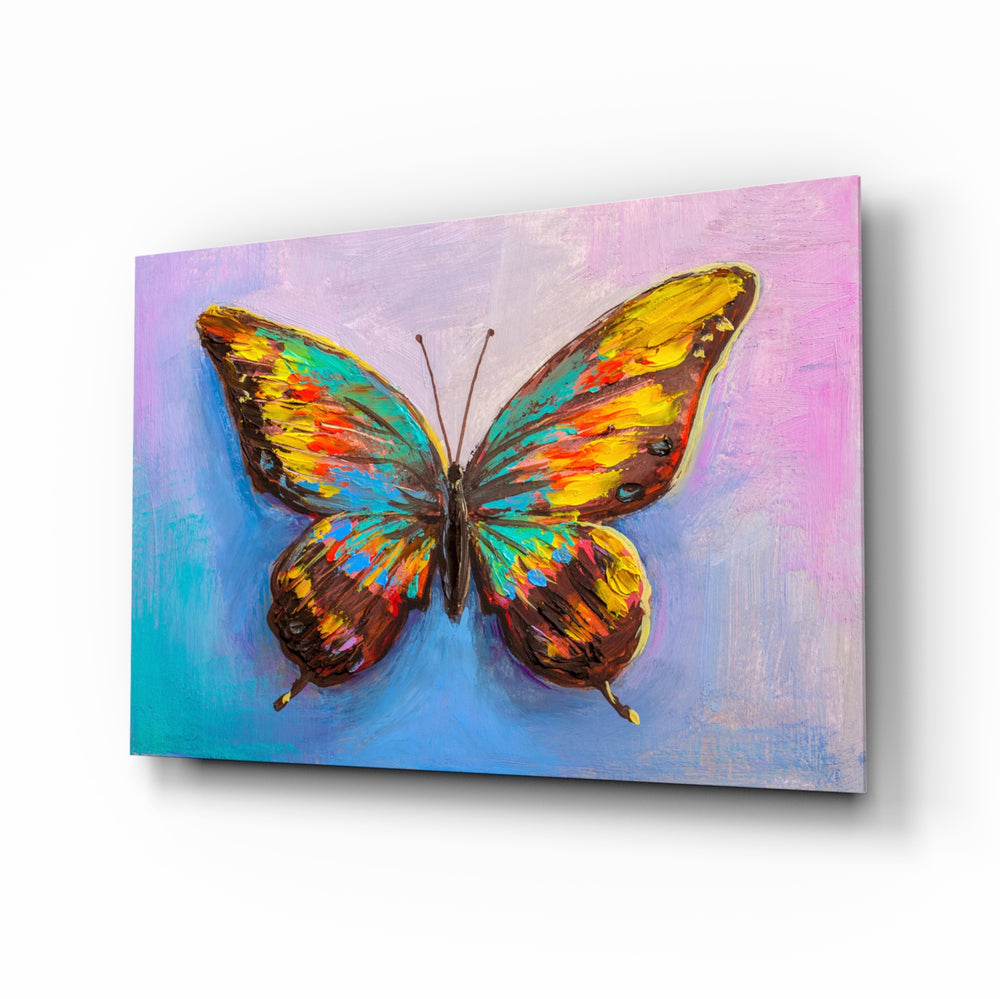 Butterfly glass wall art displayed above a console in a designer interior