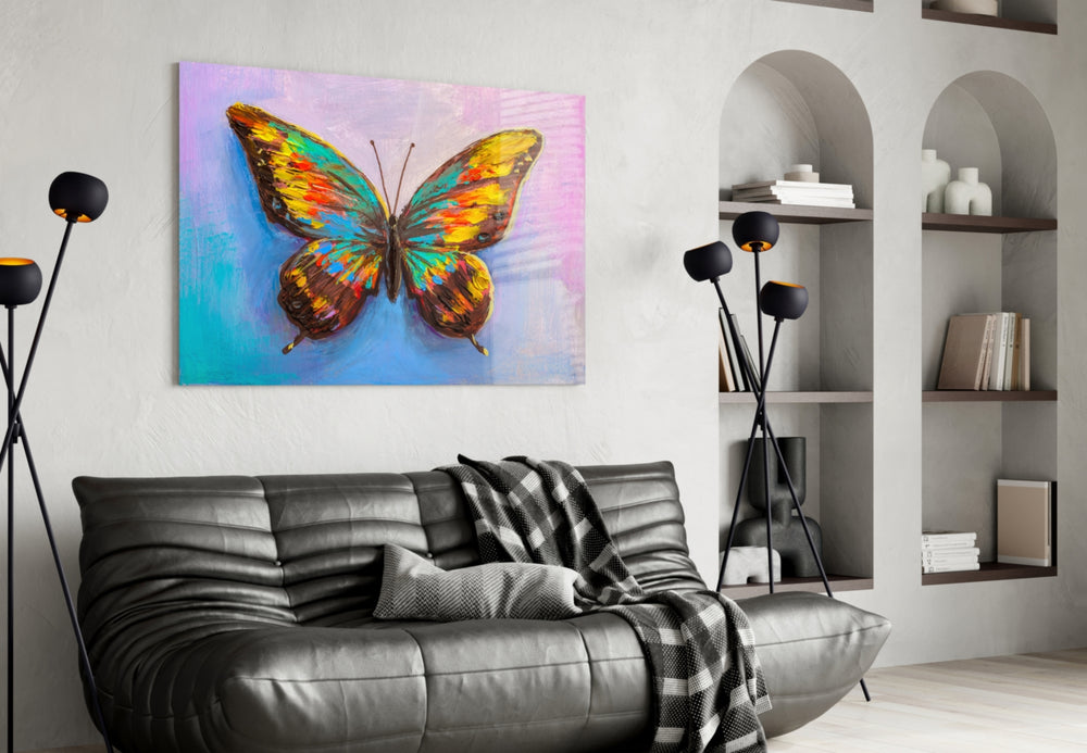 Butterfly glass wall art styled above a bed in a whimsical child's room