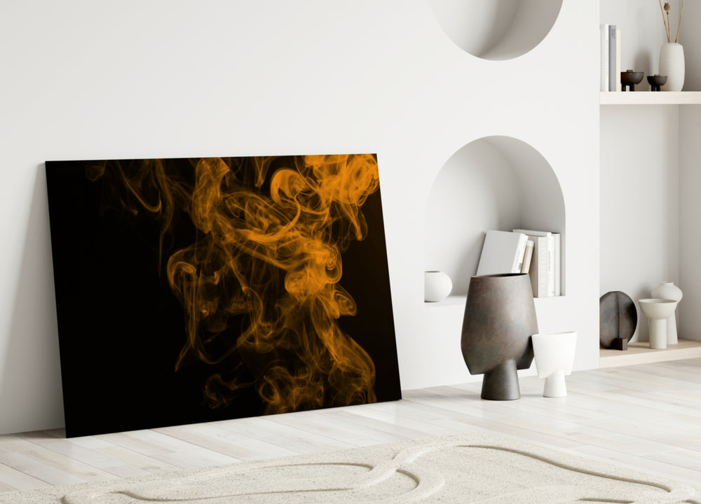 Close-up detail of orange tendrils curling against black void