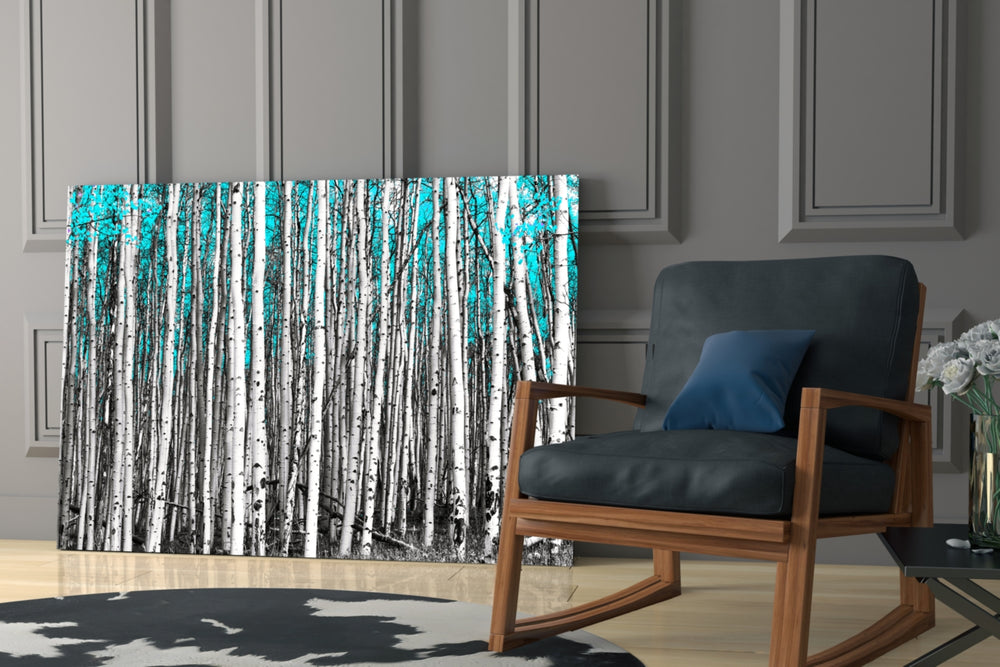 Blue Forest glass print enhancing a foyer with woodland drama