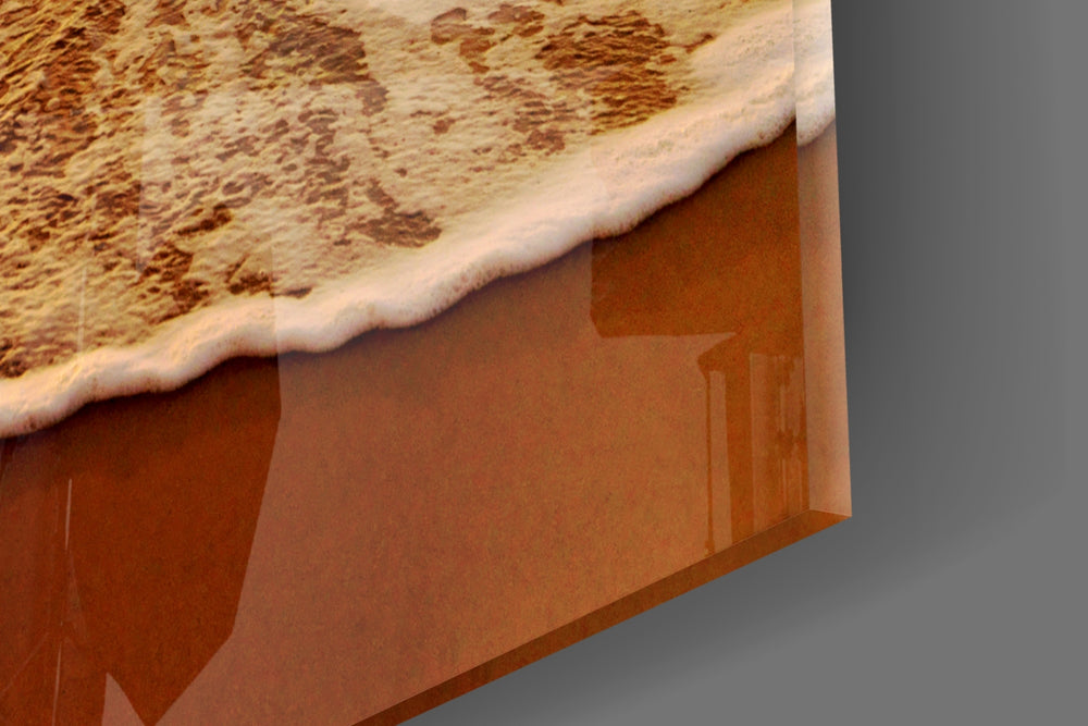 Sunset artwork anchoring a wall with calm vacation palette