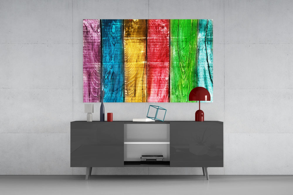 Colored Wood panel catching gallery light to reveal its tactile knot