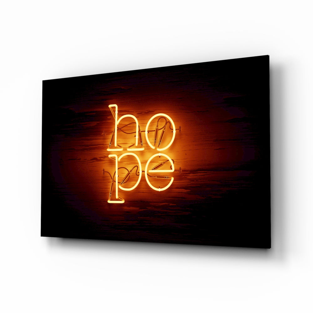 Hope glass wall art displayed above a console in a designer interior