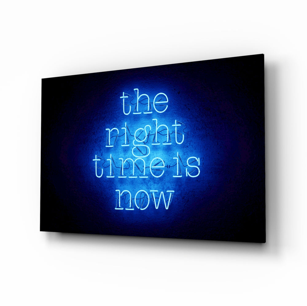 The Right Time Is Now glass wall art displayed above a console in a designer interior