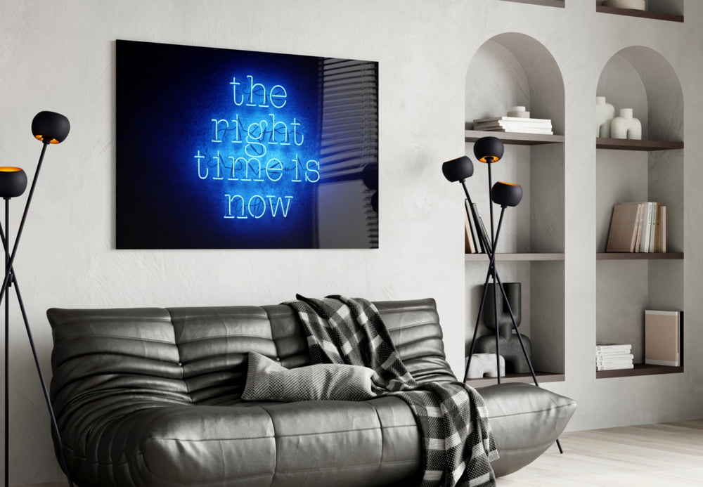 The Right Time Is Now glass wall art styled above a desk in a creative office