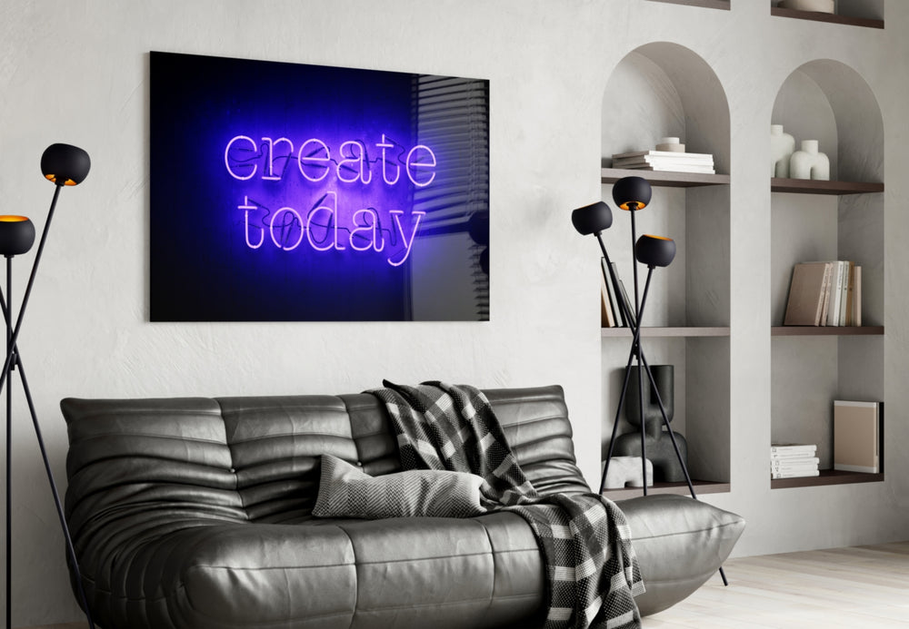 Create Today glass wall art styled above a desk in a maker's studio