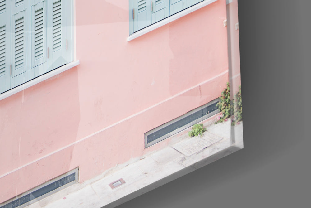 Pink House artwork anchoring a wall with soft wanderlust palette