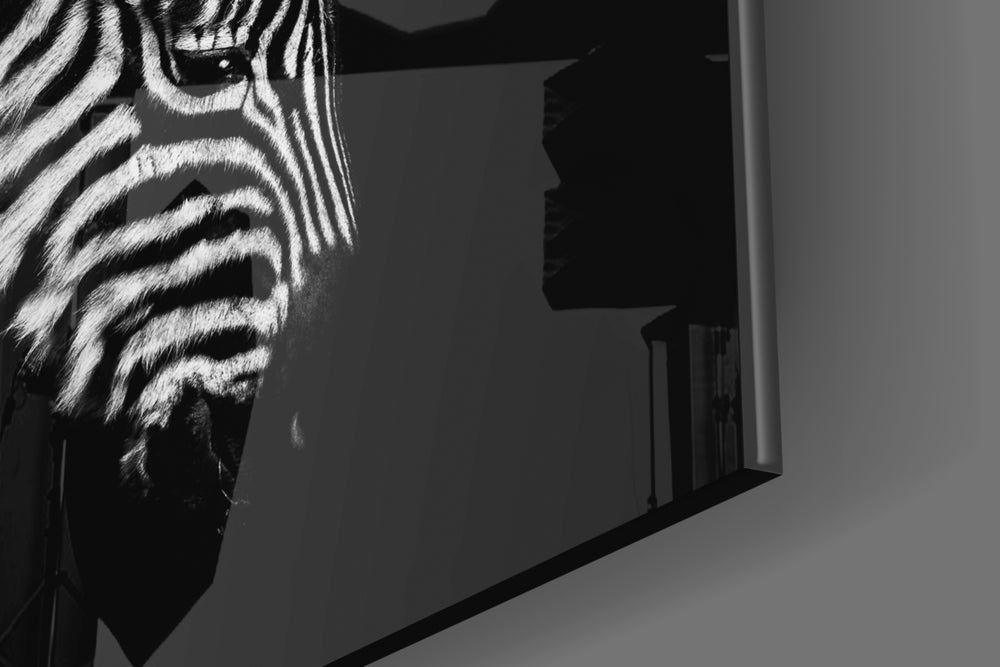 Zebra artwork anchoring a wall with moody safari palette