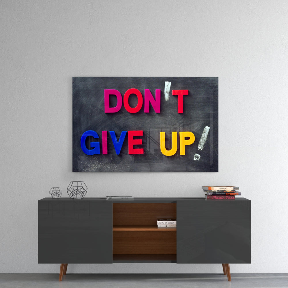 Don't Give Up panel catching gallery light to reveal its tactile texture