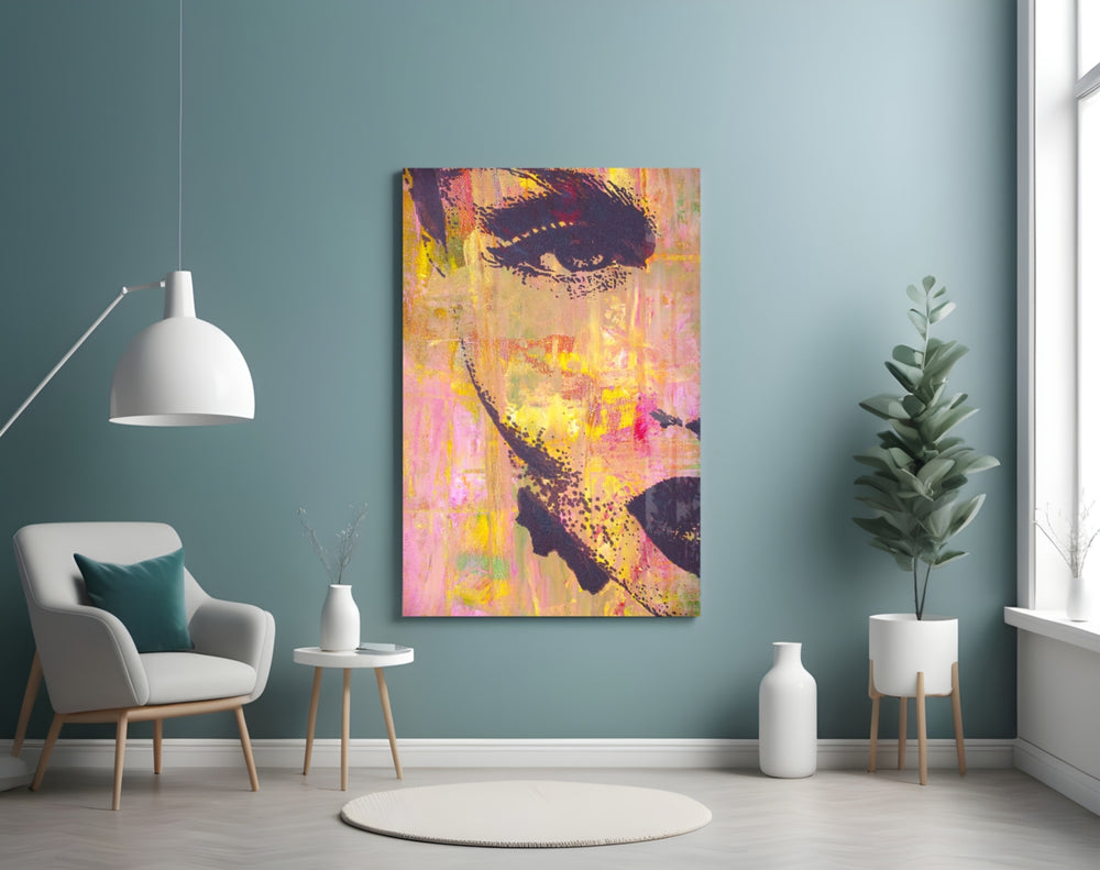 Women's glass wall art styled above a desk in a girl's room