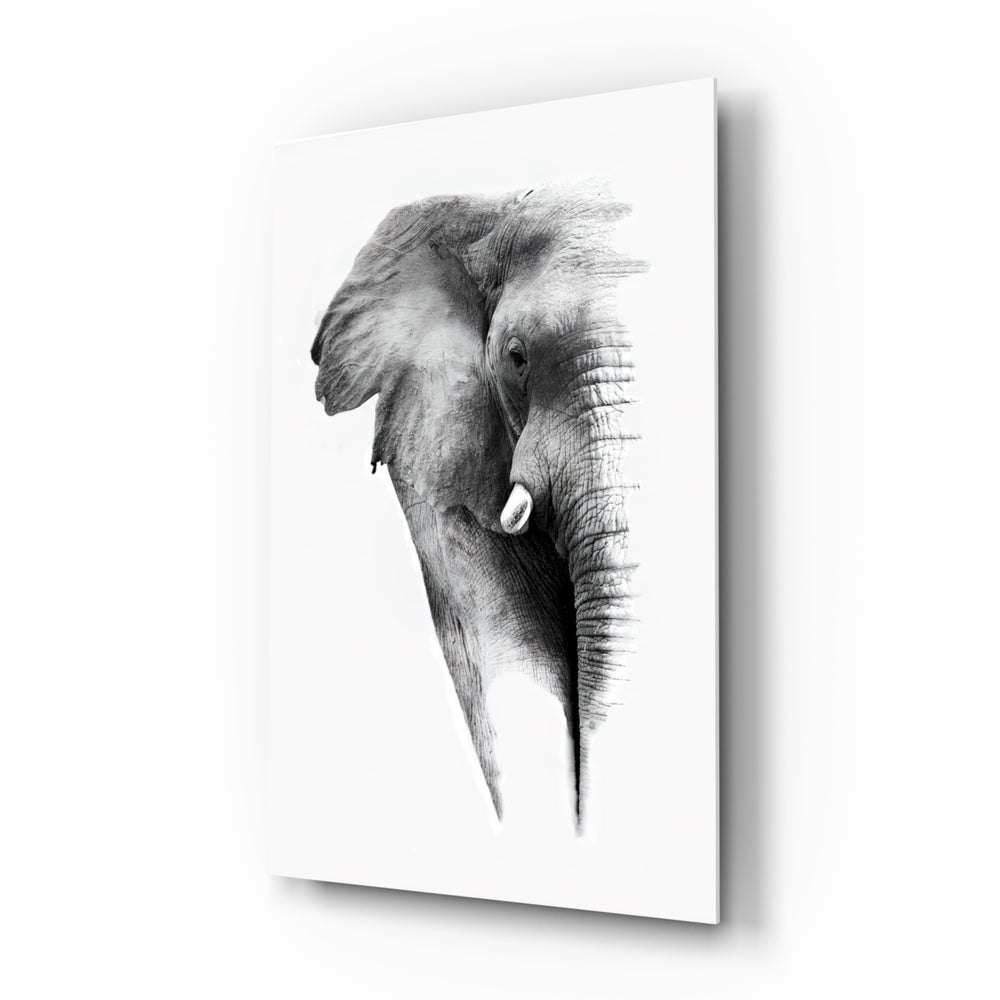 Elephant glass wall art displayed above a console in a designer interior