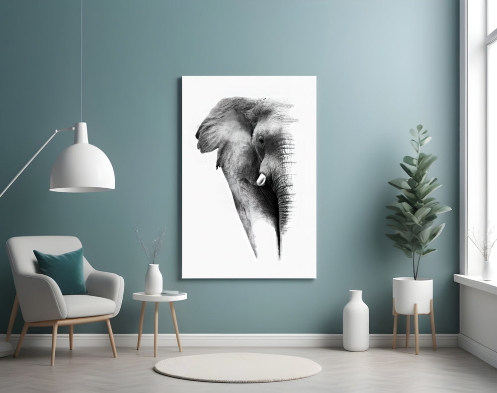 Elephant glass wall art styled above a desk in a reflective study