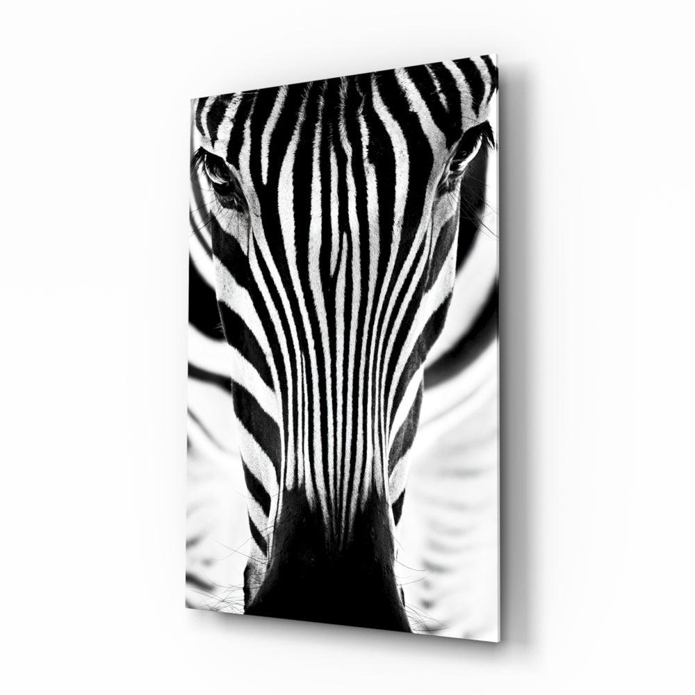 Zebra glass wall art displayed above a console in a designer interior