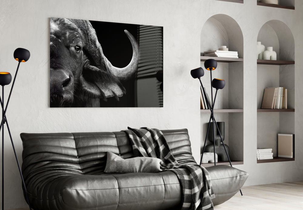 Bison glass wall art styled above a desk in an introspective study