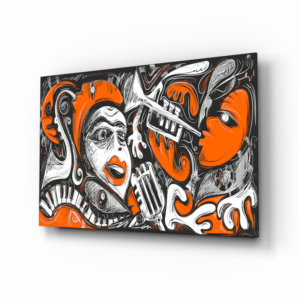 Picasso glass wall art displayed above a console in a designer interior