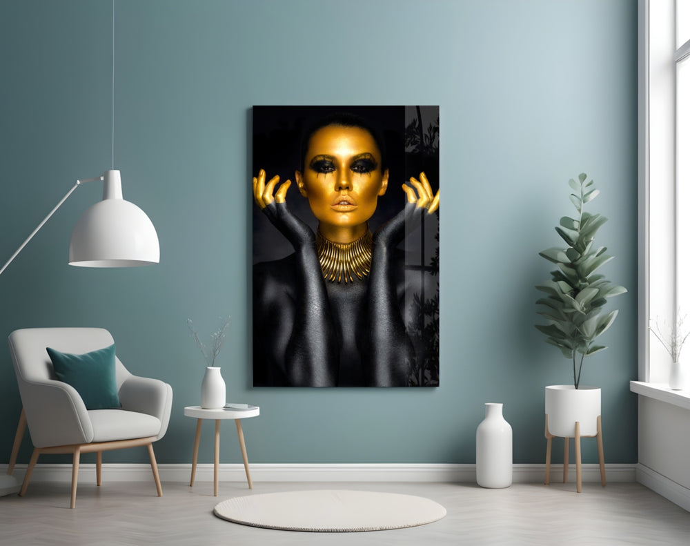 Gold Woman glass wall art styled above a vanity in a powder room
