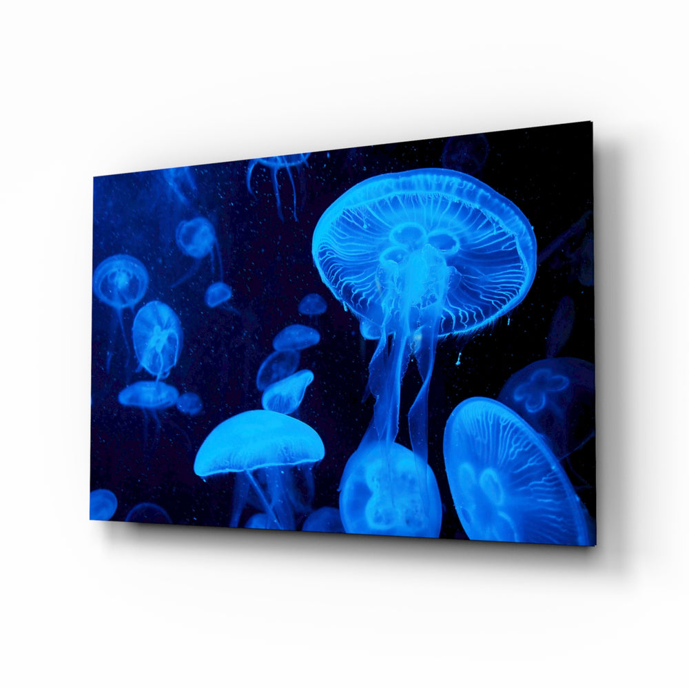 Jellyfish glass wall art displayed above a console in a designer interior
