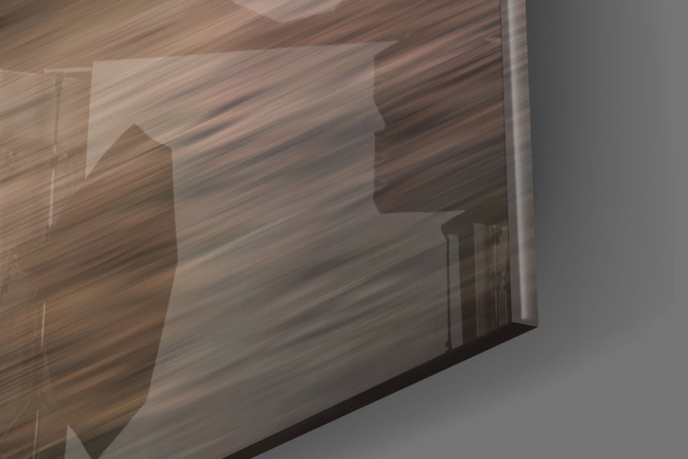 Coastal artwork anchoring a wall with warm coastal palette