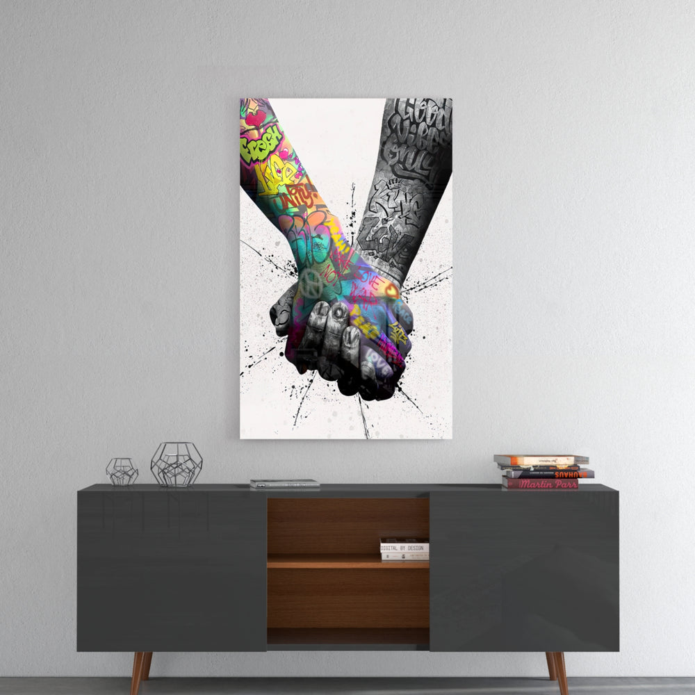 Hand in Hand panel catching gallery light to reveal its tactile spray
