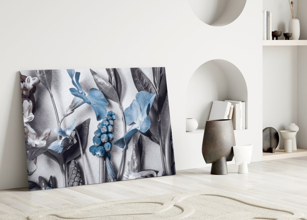 Close-up detail of muscari and cornflower against silvered grey