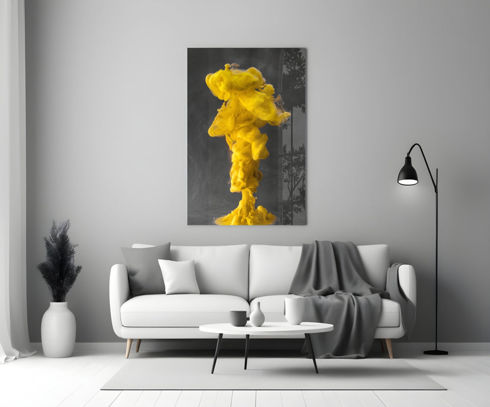 Close-up detail of yellow mushroom-cloud against charcoal tank