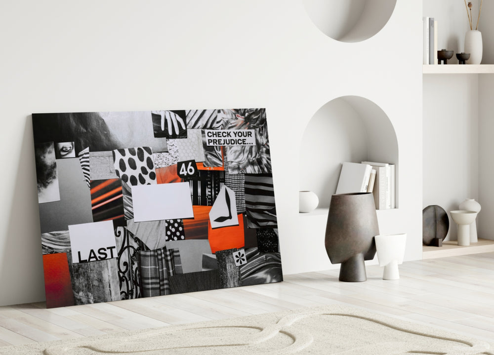 Close-up detail of monochrome and scarlet swatches with bold slogan