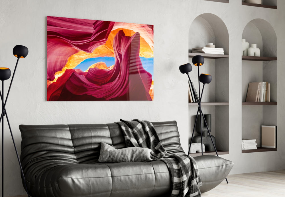 Red Valley glass wall art styled above a desk in an explorer's study