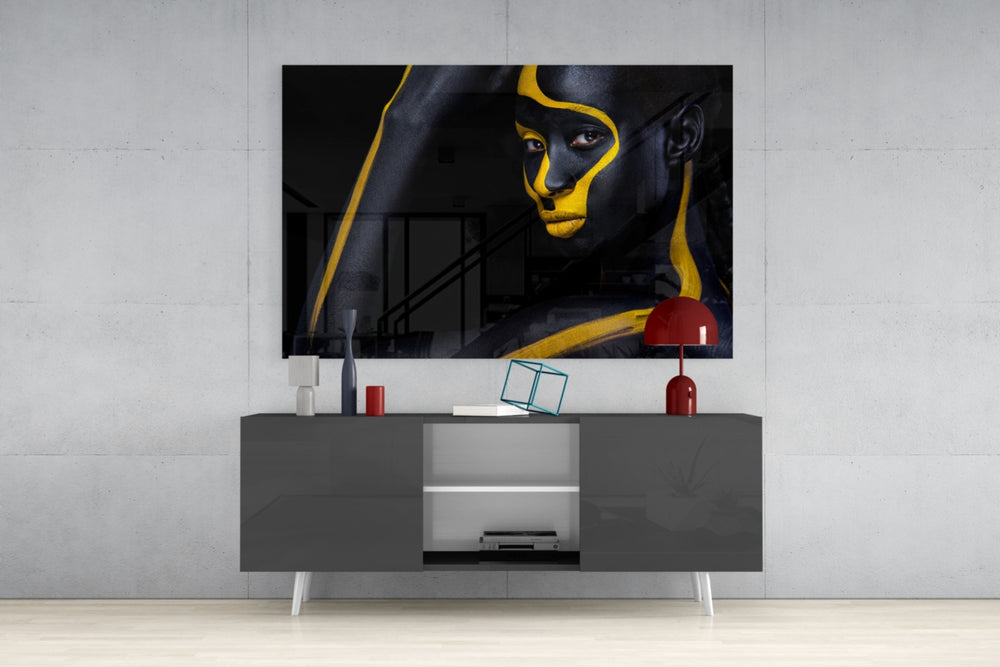 Gold Woman panel catching gallery light to reveal its tactile gloss