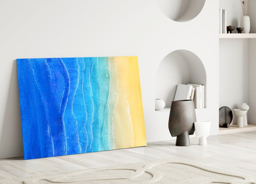 Close-up detail of foam tide-lines between cobalt and honey