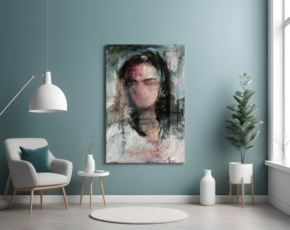 Women's glass wall art styled above a desk in a reflective study