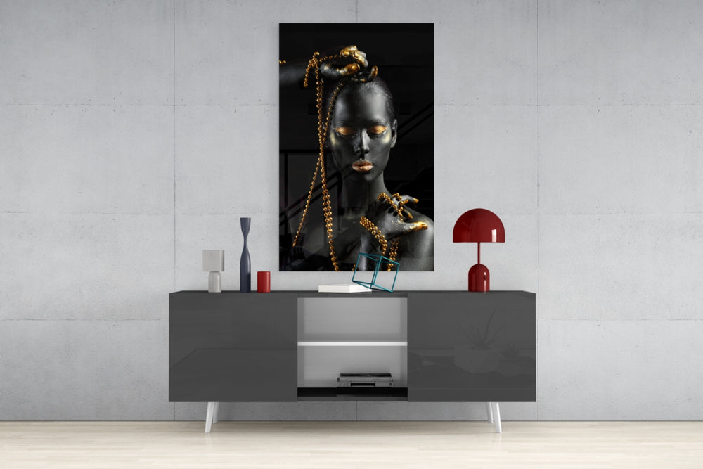 Gold Woman panel catching gallery light to reveal its tactile shimmer