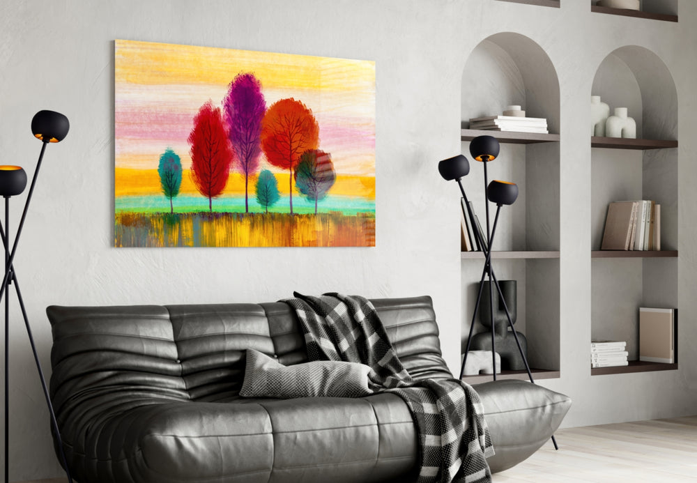 Colorful Trees glass wall art styled above a desk in a child's room