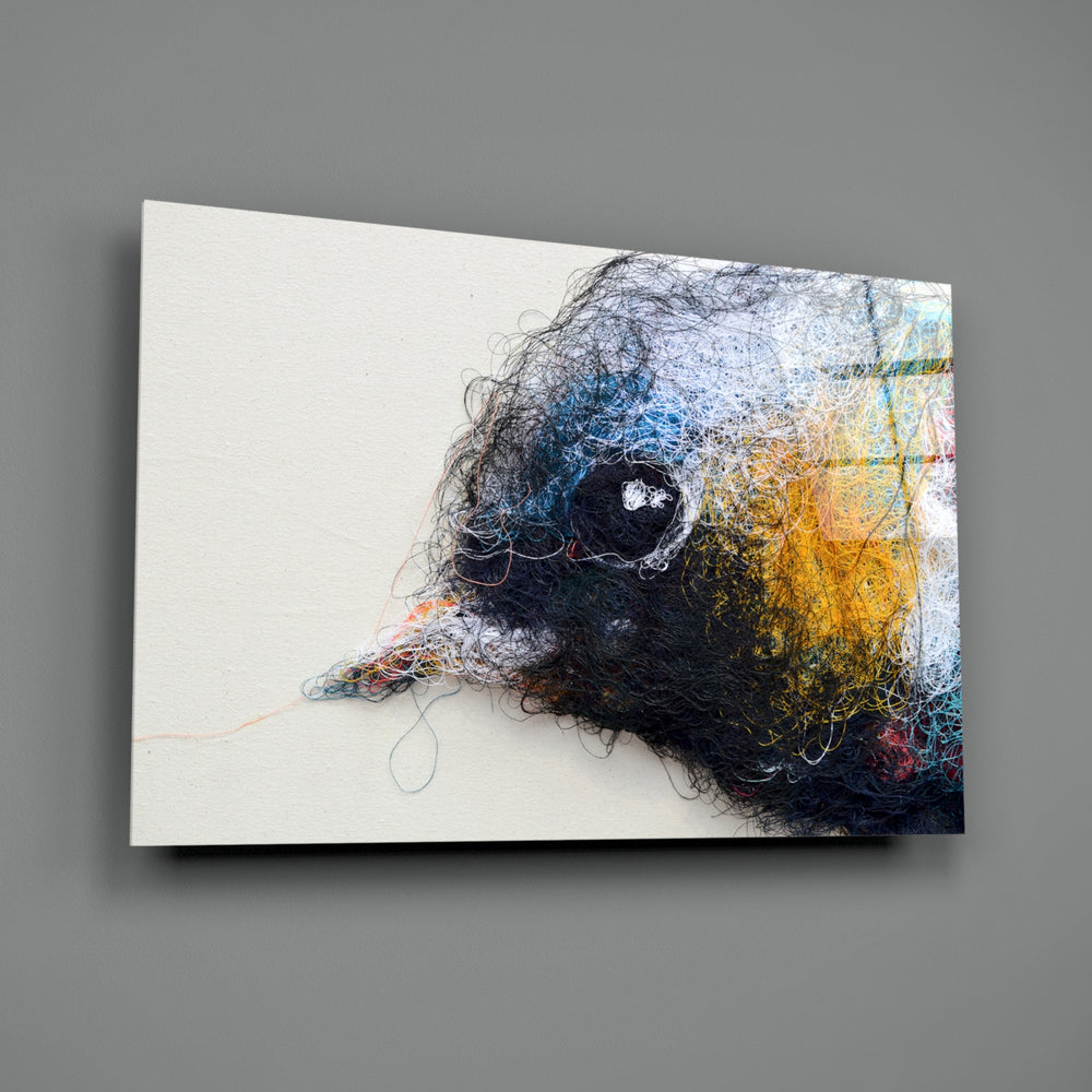 Embroidered-bird panel bringing whimsical softness to a contemporary living space