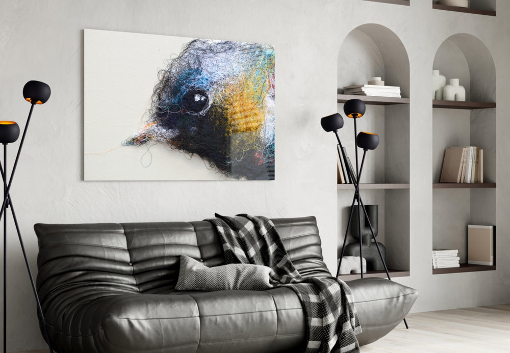 Tiny Bird glass wall art styled above a crib in a nursery