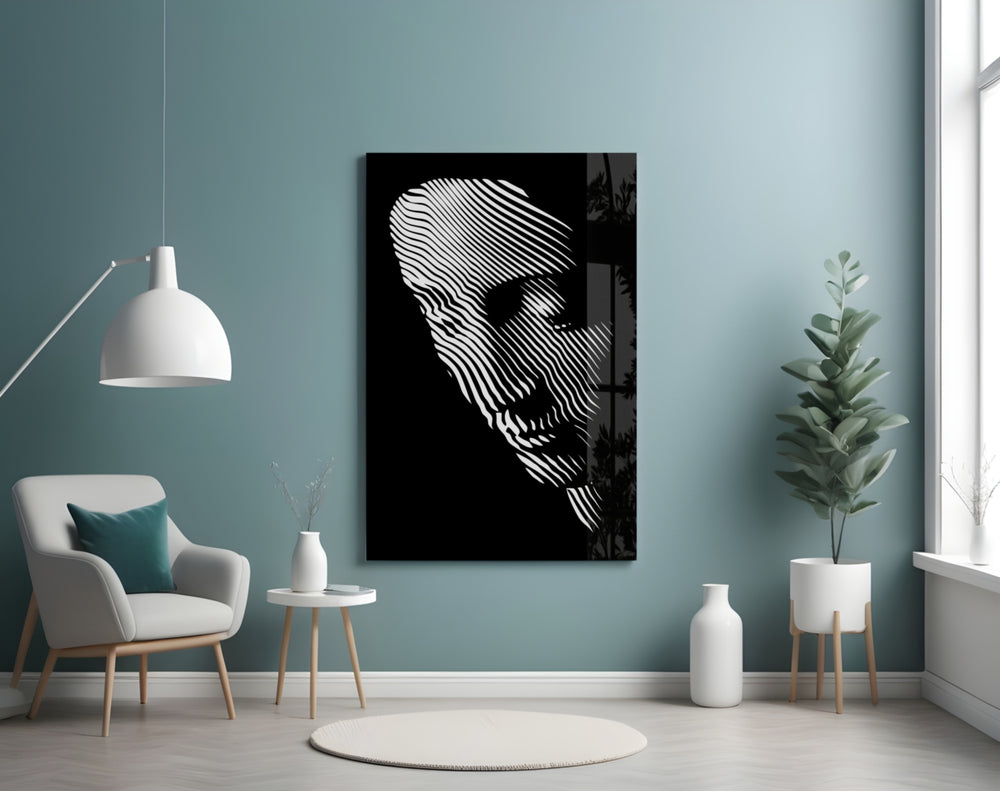 Contemplation glass wall art styled above a desk in a reflective study