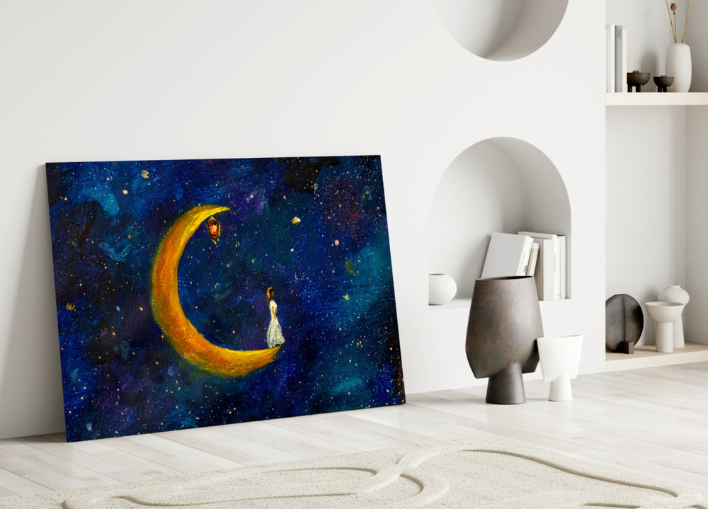 Close-up detail of girl in white dress on crescent moon