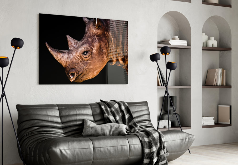 Rhino glass wall art styled above a desk in a study