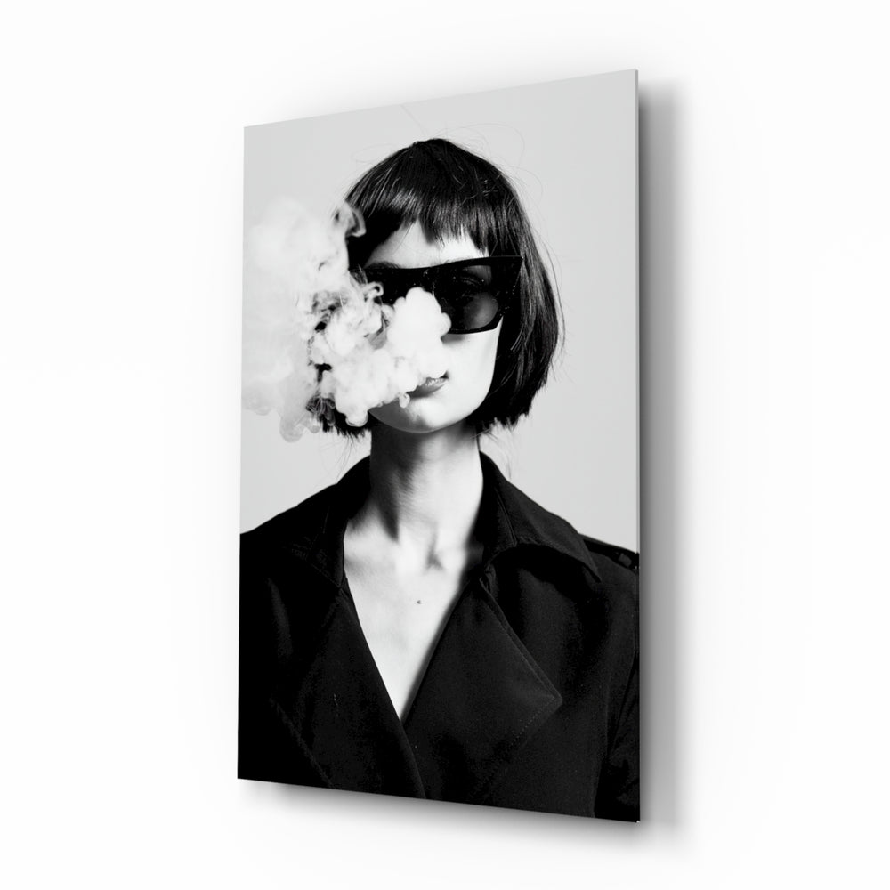 Smoke glass wall art displayed above a console in a designer interior