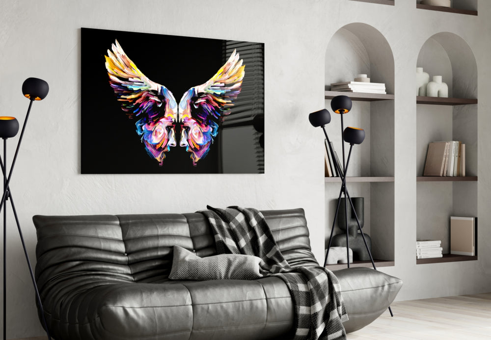 Wings glass wall art styled above a desk in a girl's room