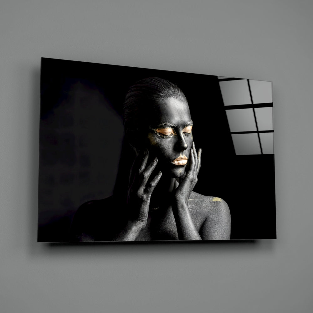 Black-and-gold panel bringing luxe drama to a contemporary living space