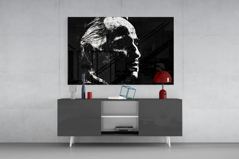 Godfather glass wall art catching light to reveal its painted splatter