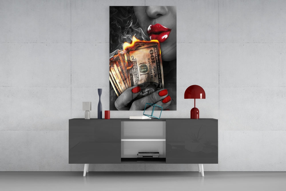 Burn the Money Lips glass wall art catching light to reveal its painted flame