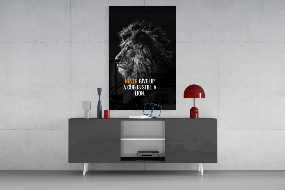Lion Cub glass wall art catching light to reveal its painted mane