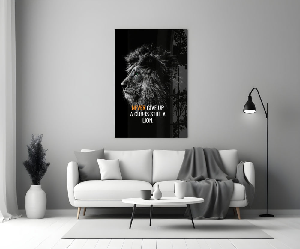Close-up detail of B&W lion with quote behind glass