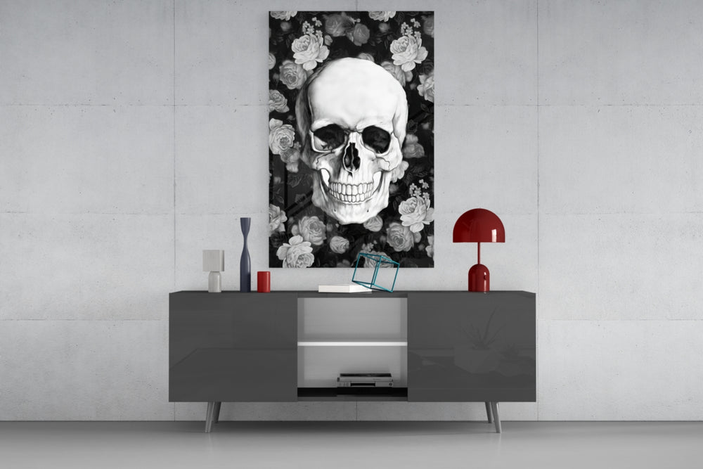 Skull glass wall art catching light to reveal its painted petals