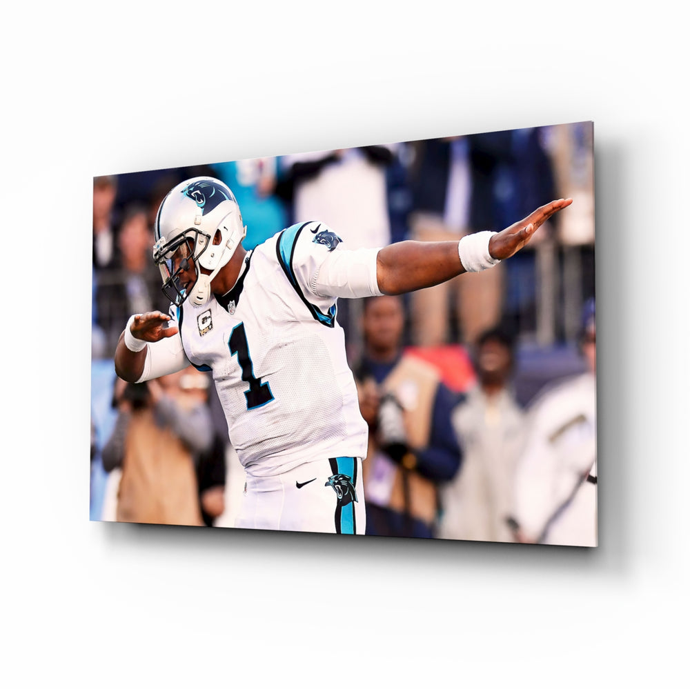 Cam Newton glass wall art in a modern home cinema